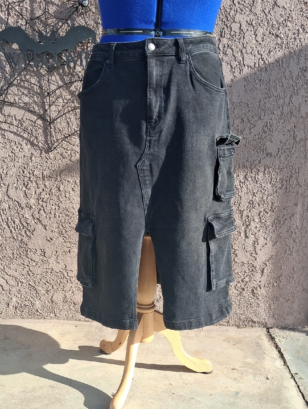 Black Womans Cargo Denim Skirt with Utility Pockets
